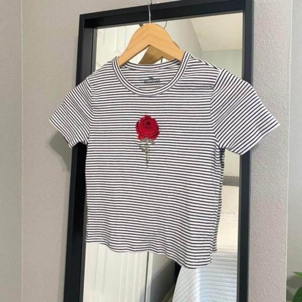 Hollister top with rose and stem saying Hollister